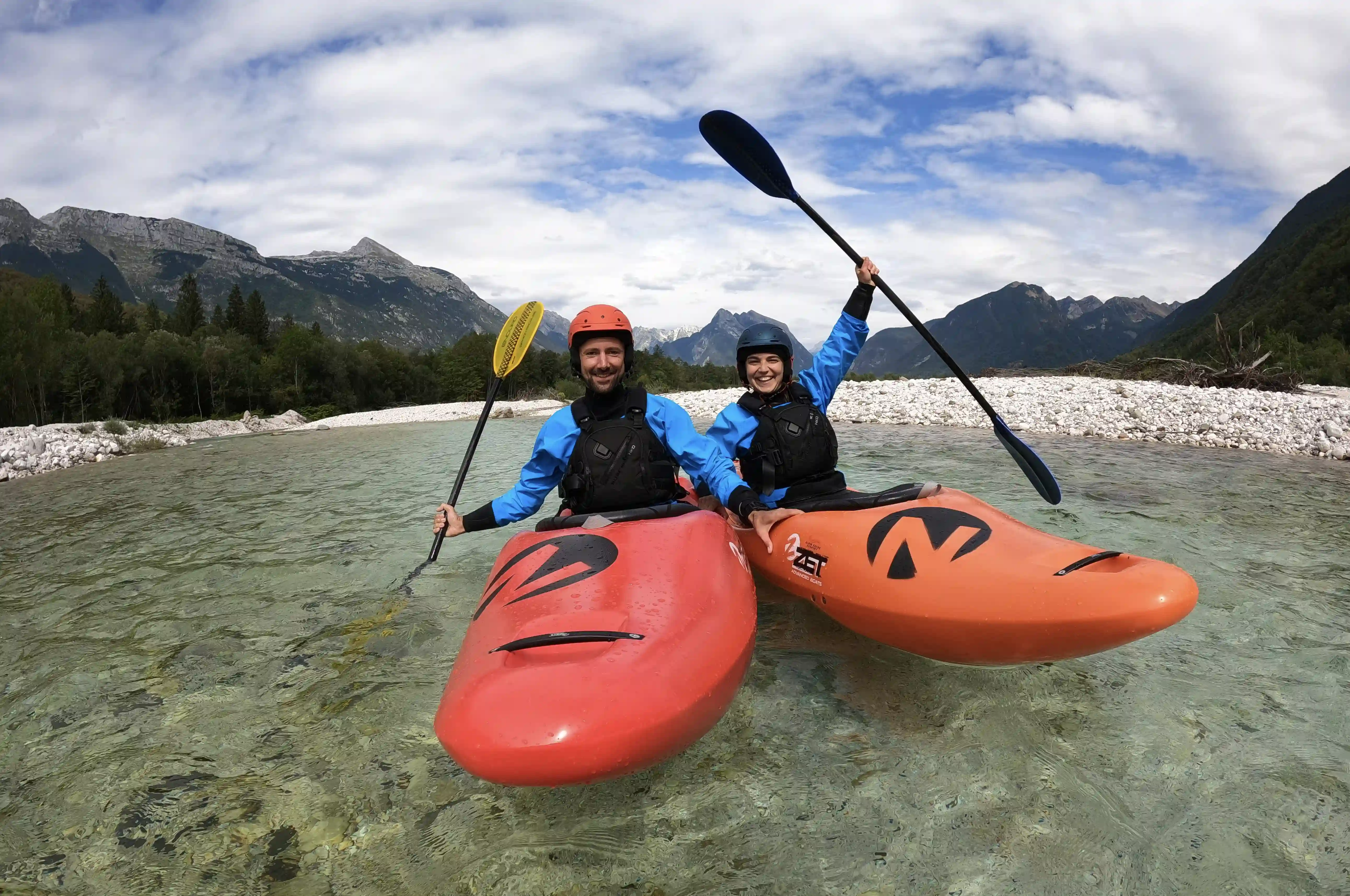 Two kayakers on the Soca