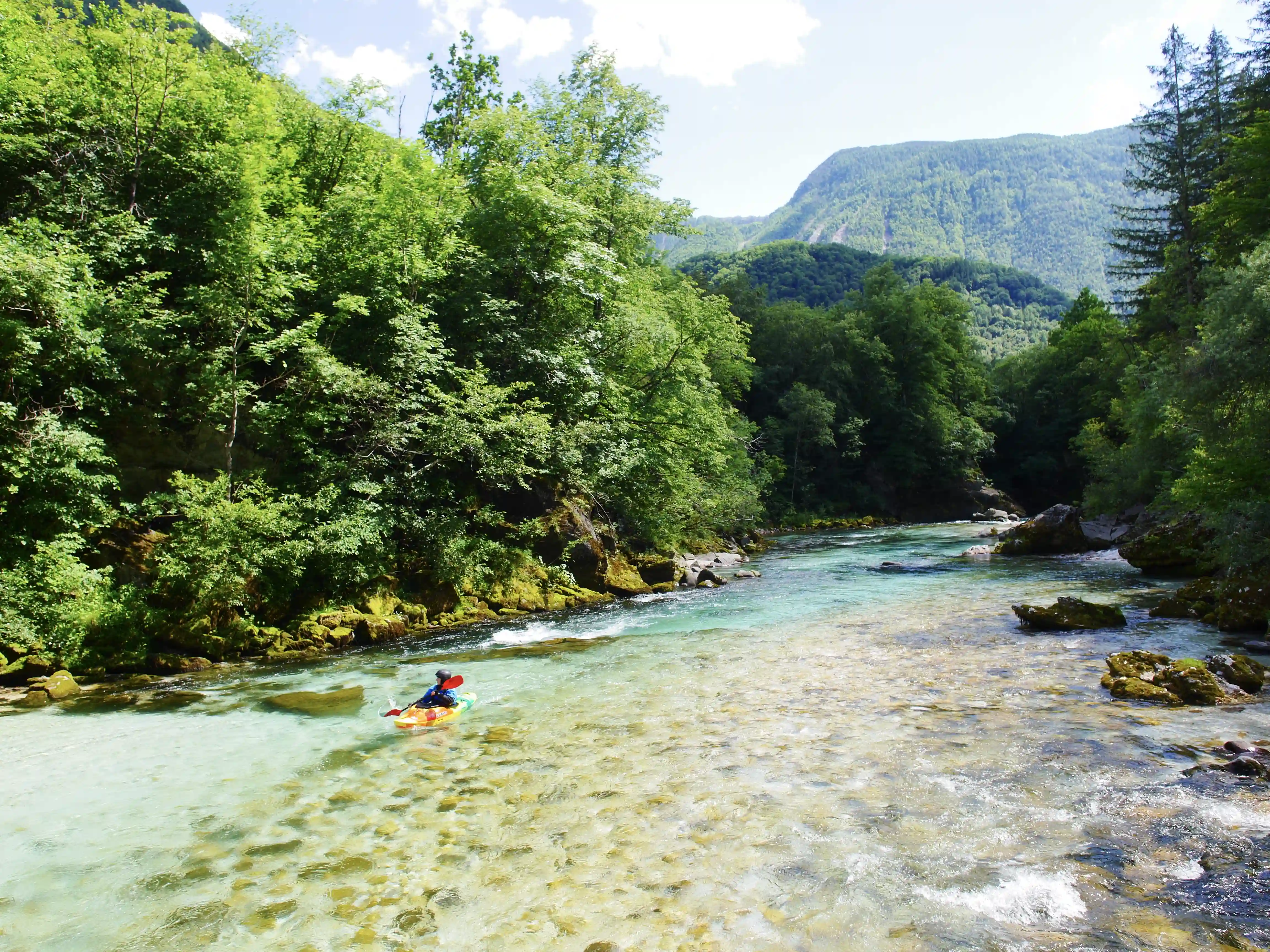 Kayaker going down the river on the soca