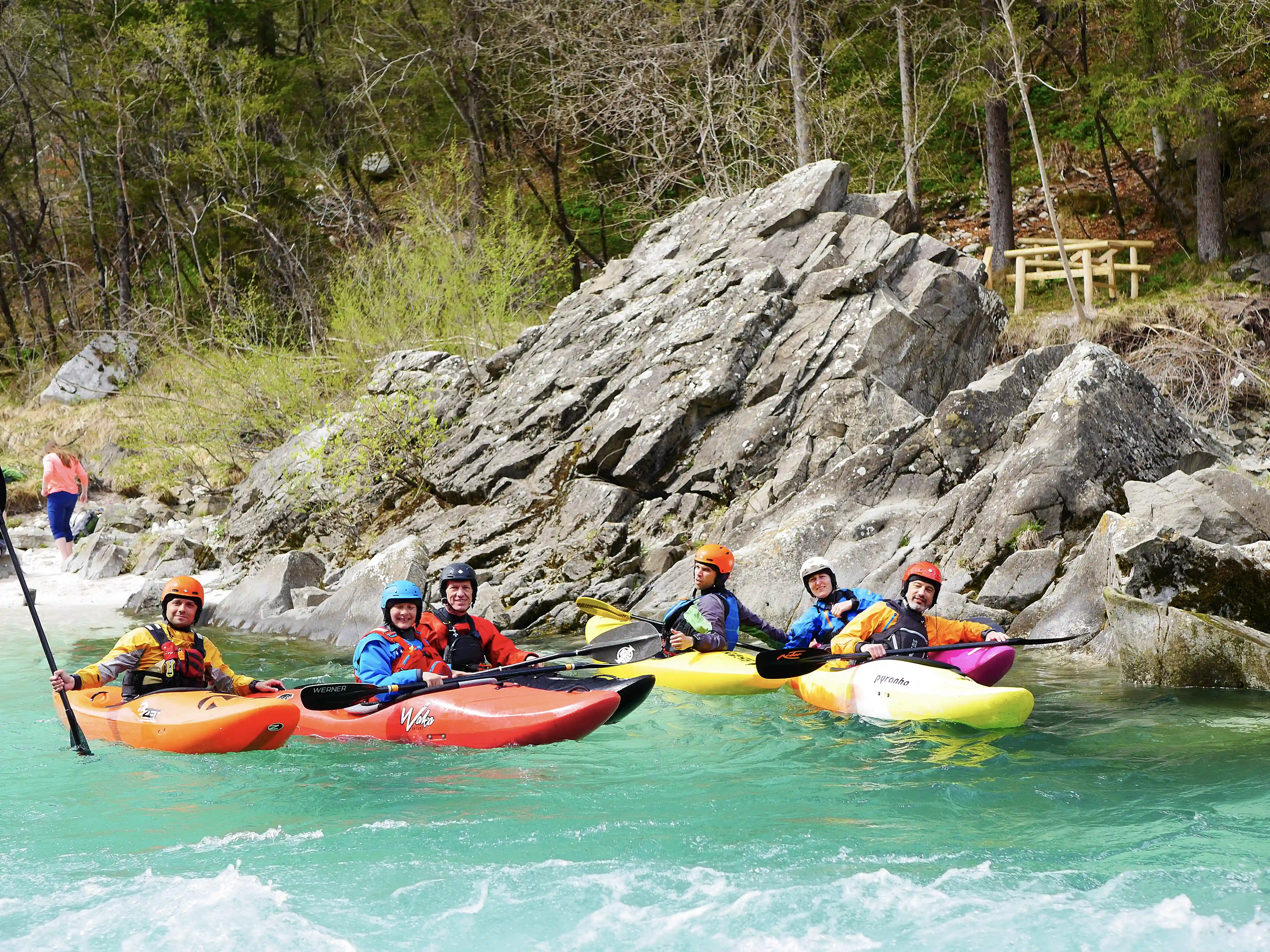 Group of friends taking a kayak course